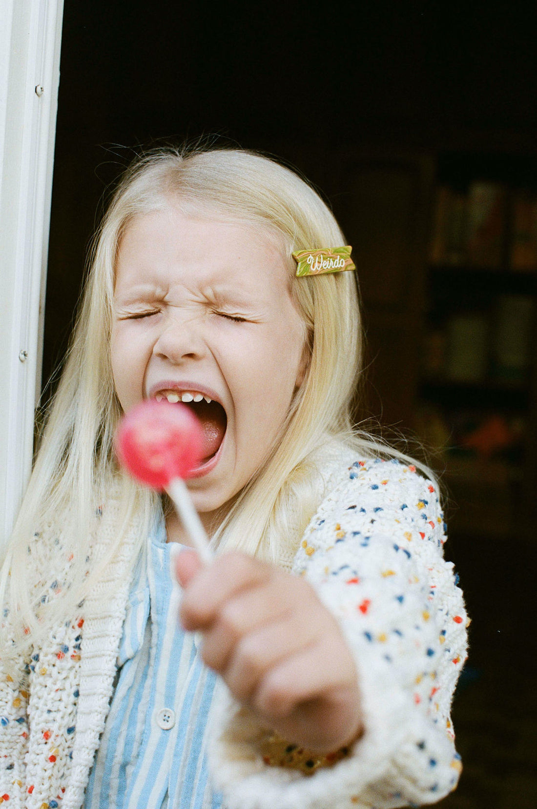 blonde girl with lollipop screaming child weirdo hair clip cute hair clips toddler girl alligator clip thin hair fine hairstyles baby kids toddlers alex steele