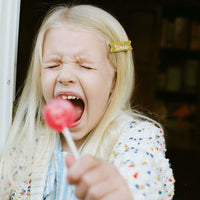 blonde girl with lollipop screaming child weirdo hair clip cute hair clips toddler girl alligator clip thin hair fine hairstyles baby kids toddlers alex steele